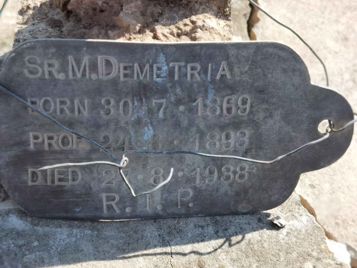 DEMETRIA M. 1869-1938